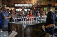 A group of people doing a wine tasting tour of the Mornington Peninsula.